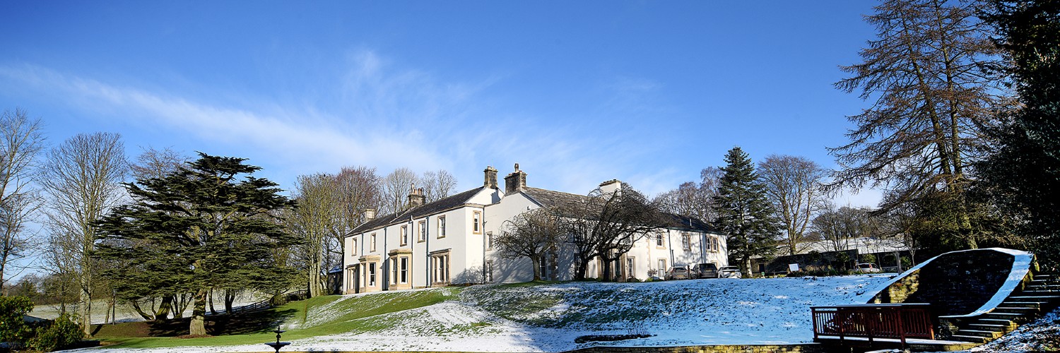 Exterior of Farlam Hall in wintertime
